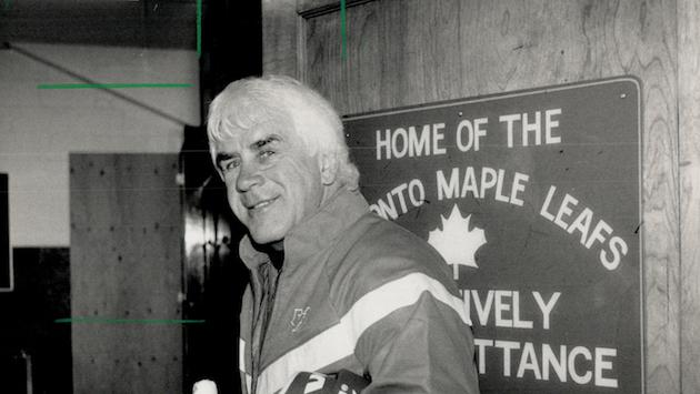 Why the smile?: Coach John Brophy of the Maple Leafs gave a broad smile yesterday as he left the Gar